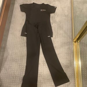 Navy colored “Greys anatomy” scrubs with USC KECK monograming